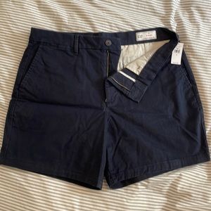 WT-gap shorts. 34 inch waist, 6 inch short. Dark blue